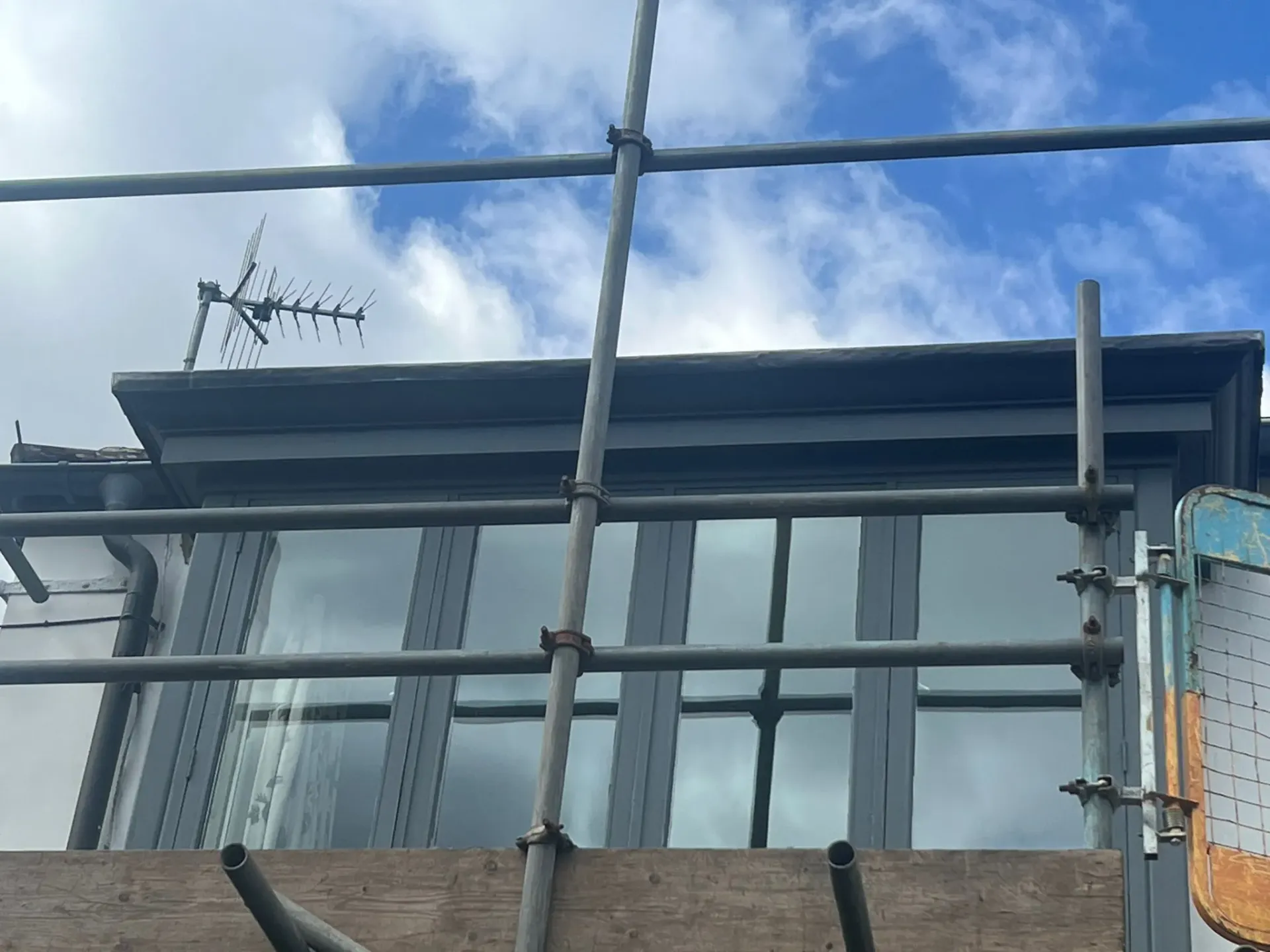 Scaffolding in place for roofing work on a domestic property in Sheffield.