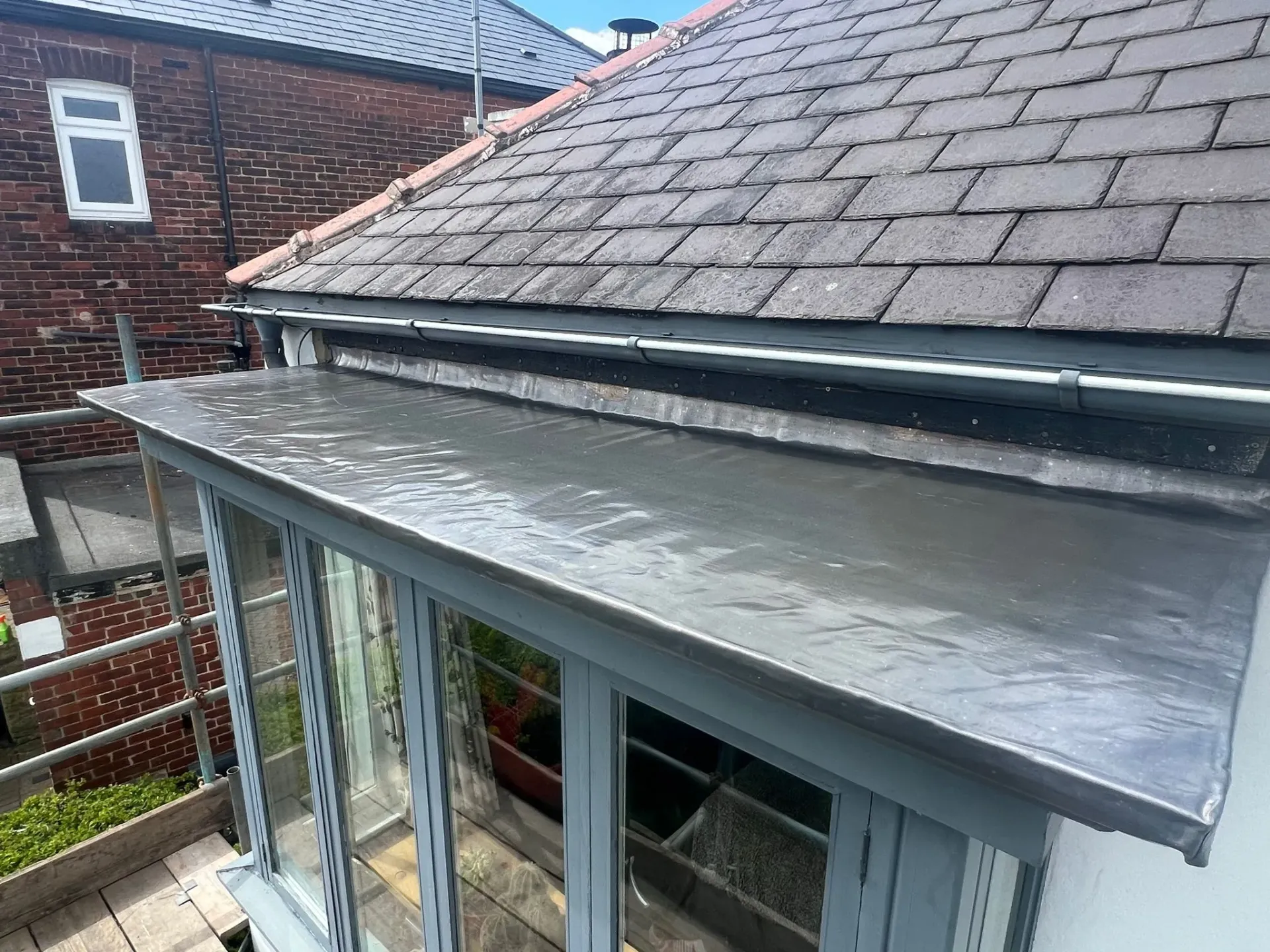 New flat roof installation on an extension