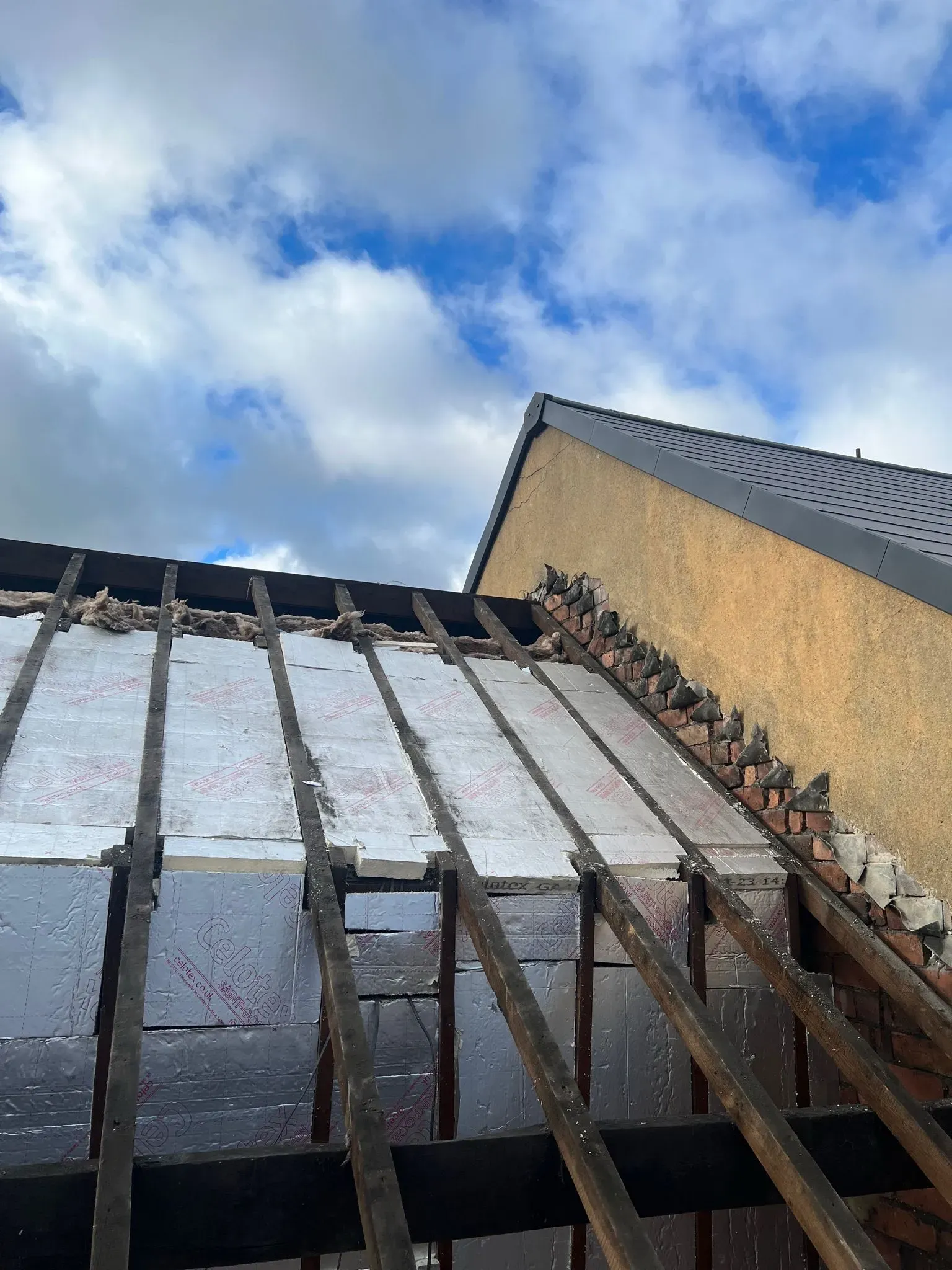 Pitched roof renovation with insulation being installed in Sheffield or the Peak District