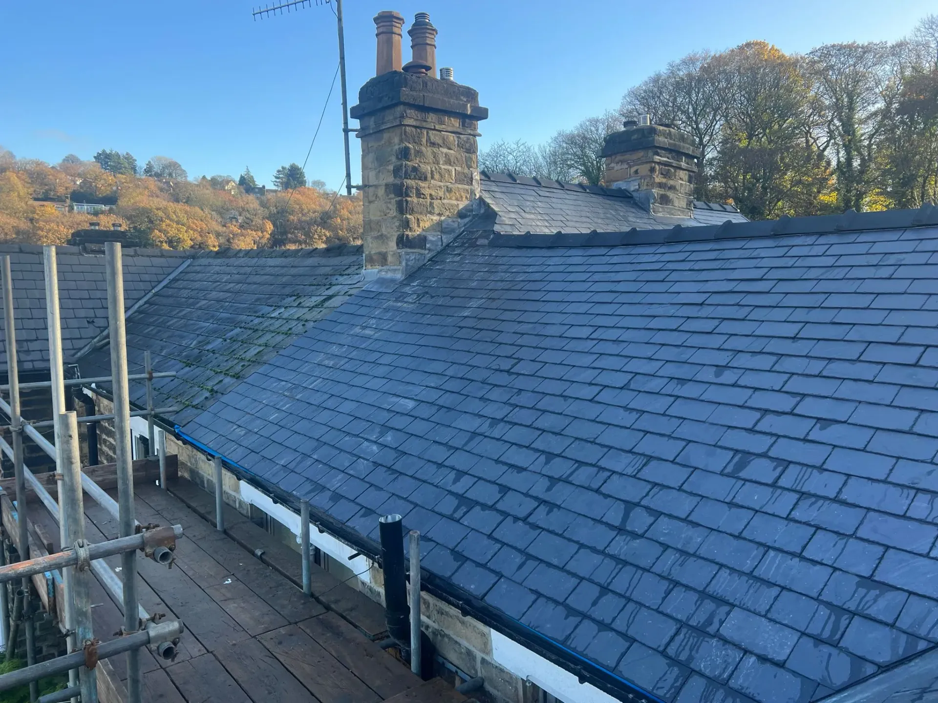 Slate pitched roof repair or installation with scaffolding in Sheffield or the Peak District
