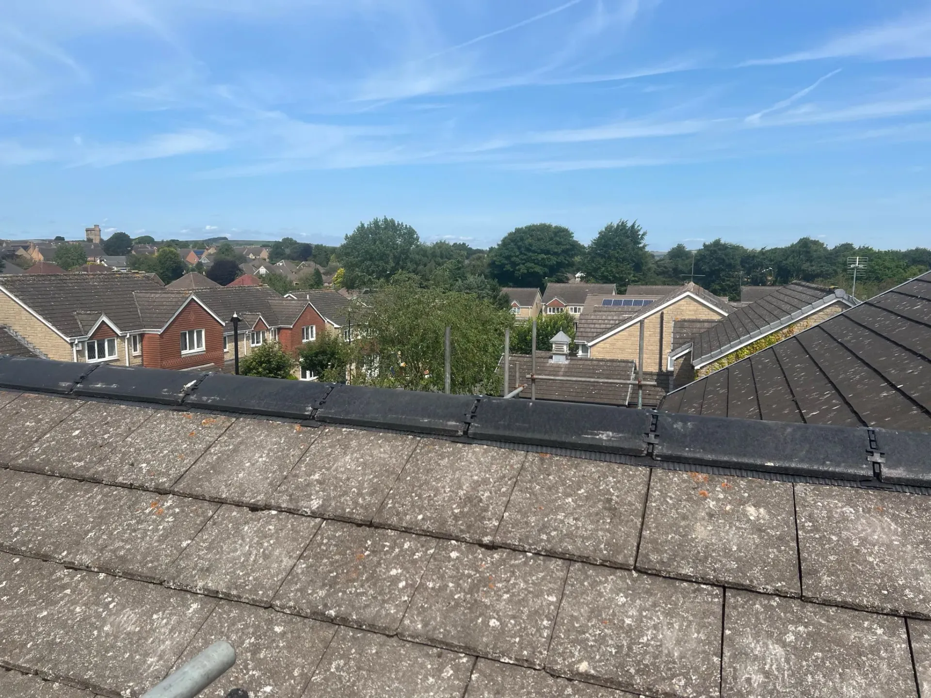 Tiled pitched roof view over residential houses
