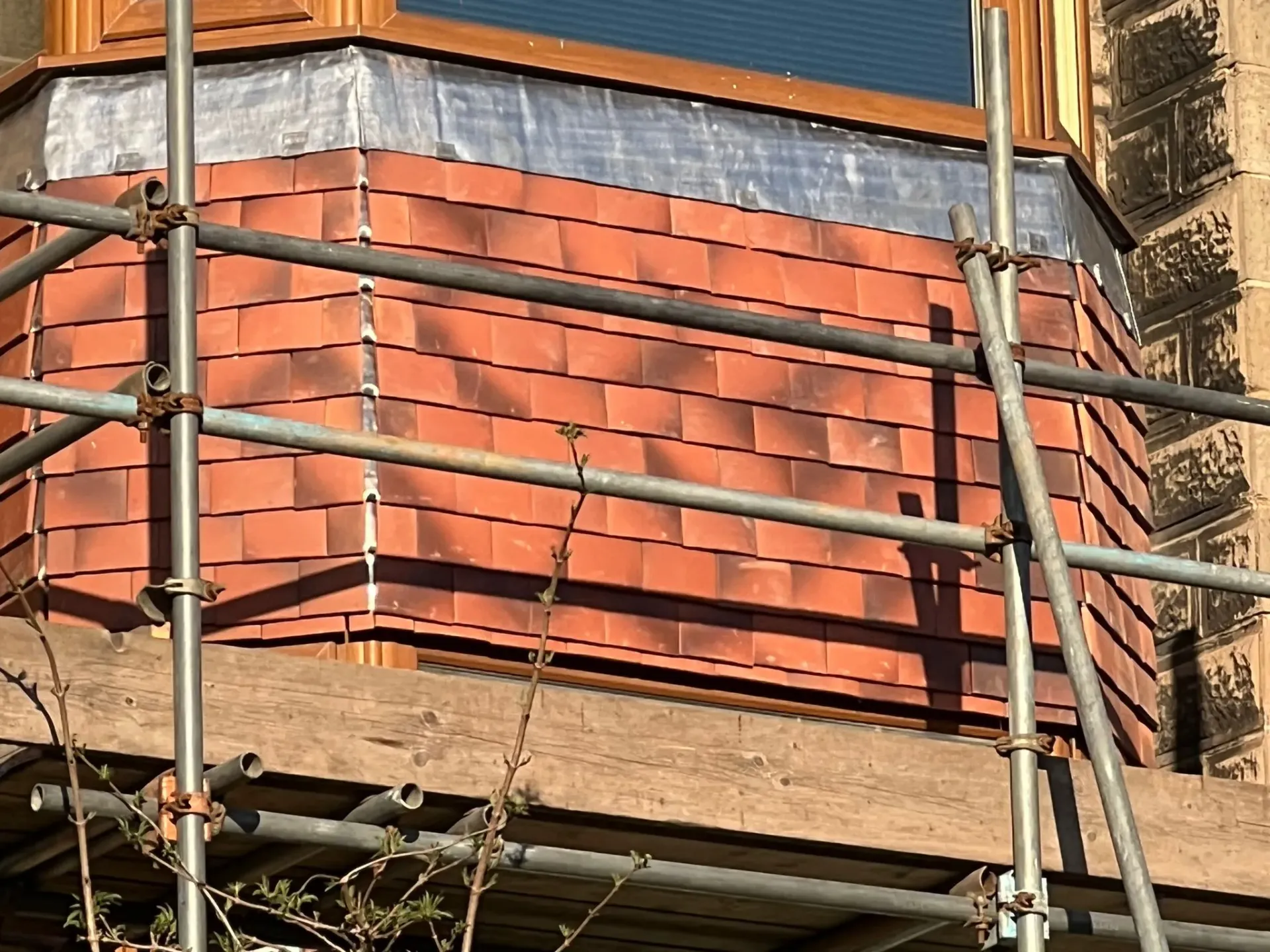 Expert installation of roof tiling and lead work on a bay window in Sheffield or the Peak District by Alliance Roofing Services.